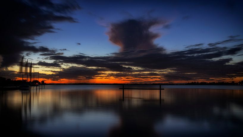 A beautiful morning, full of color in the sky, the start of a new day. by Hans de Waay