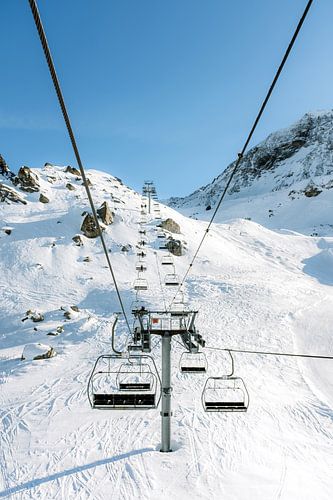 From the chairlift in the French Alps - Winter sports photo in the sun