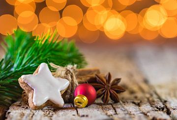 Christmas composition with star gingerbread, spices, fir branch by Alex Winter