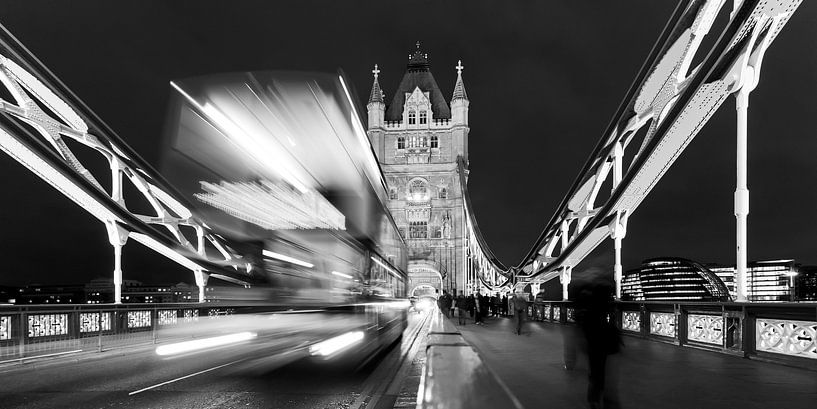 Double decker bus on Tower Bridge in London / black and white by Werner Dieterich