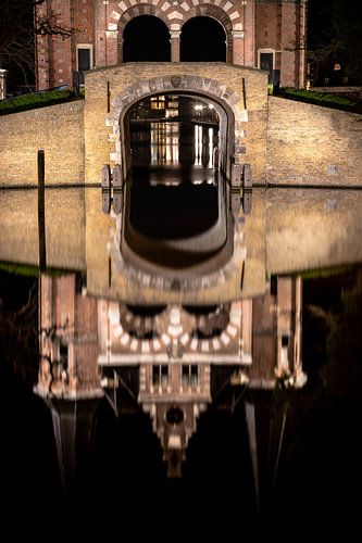 Mirroring water gate water of city canal Sneek