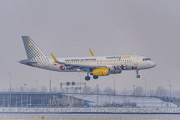 Vueling Airbus A320 in Pepsi Max livery in winter.