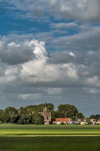 The church of the Frisian village of Lollum in the evening light