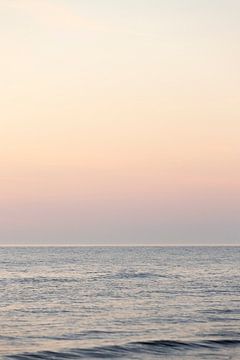 zonsondergang aan zee, pastelkleuren
