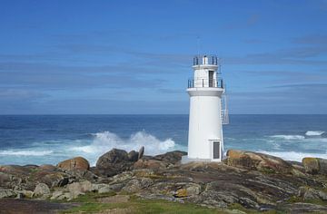 Rocky coast with lighthouse, Galicia, Spain by Rini Kools