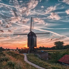 Moulin de Heusden avec le soleil levant sur Tim Vrijlandt