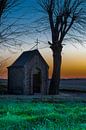 chapel in the middle of the meadow during a colorful sunset by Kim Willems thumbnail