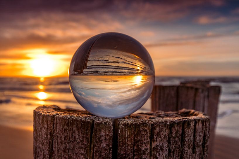Sunset in glass ball by peterheinspictures
