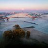 Nijmegen's skyline on a foggy autumn morning by Luc van der Krabben