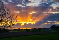 Zon achter de wolken