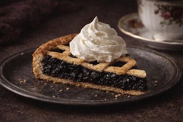 Zwarte pruimenvlaai. Op de koffie bij oma.