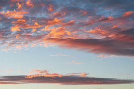 Fiery cloud formation at sunset by Rena Miller