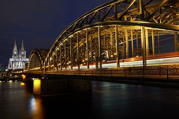 Cologne Cathedral and Hohenzollern Bridge at night by 77pixels