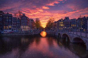 Zonsondergang Amsterdam sur Dick van Duijn