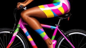 Stylish cyclist in bright colours by Frank Heinz
