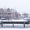 The harbor of Woerden in the snow. by John Verbruggen