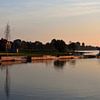 Le quai d'Harderwijk au soleil du soir sur Gerard de Zwaan