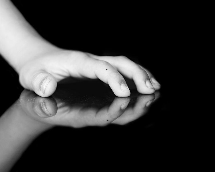 reflection of a hand. by Maren Oude Essink
