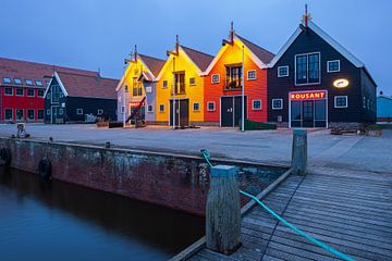 Colorful houses at the harbor of Zoutkamp