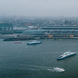 Uitzicht over de stad Amsterdam van Christian Reijnoudt