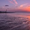 Sunset with tidal flow in Zealand by Rick van de Kraats