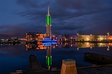 Illuminated transmission tower in Alphen aan den Rijn by Gijs Rijsdijk