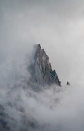 Aiguille du Dru shrouded in clouds near Chamonix, France by Mirjam Dolstra
