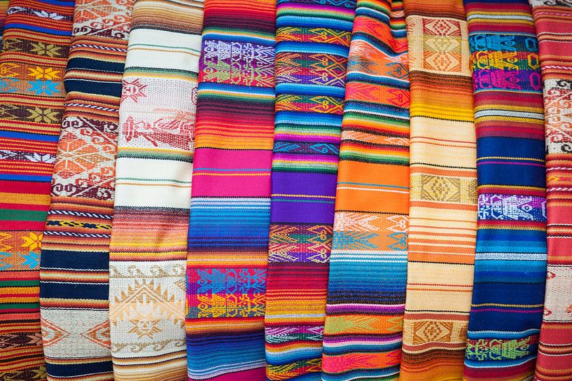 Colourful fabrics Otavalo Ecuador by Richard Wareham
