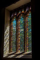 Stained glass in an old church in a small village in Devon, United Kingdom