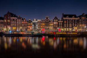 Maisons de canal d'Amsterdam la nuit