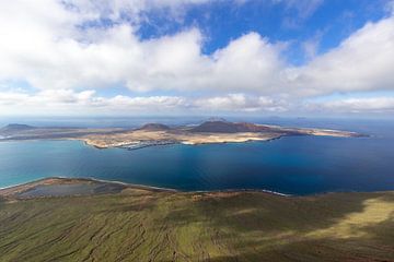 Panoramic view of the island La Graciosa from the viewpoint Mirador del Rio on the island Lanzarote by Reiner Conrad