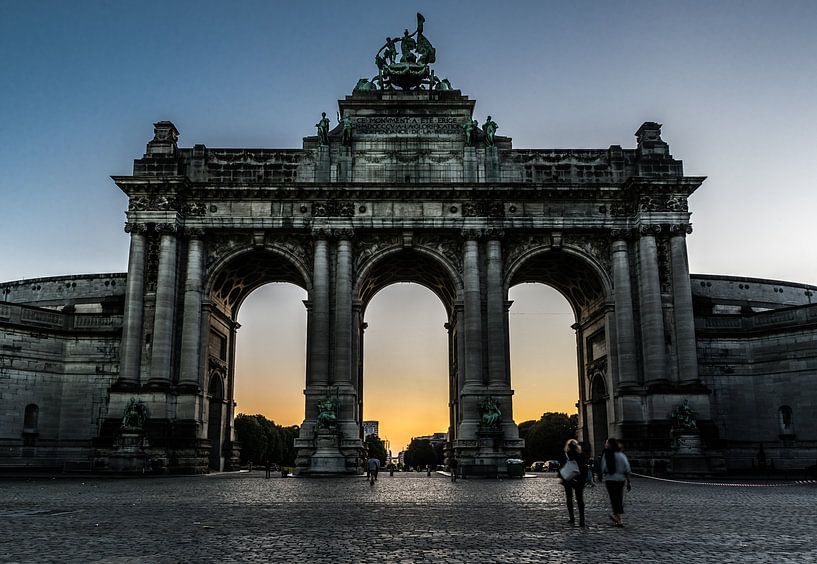 Cinquentenaire at dusk, people around the arcades by Werner Lerooy