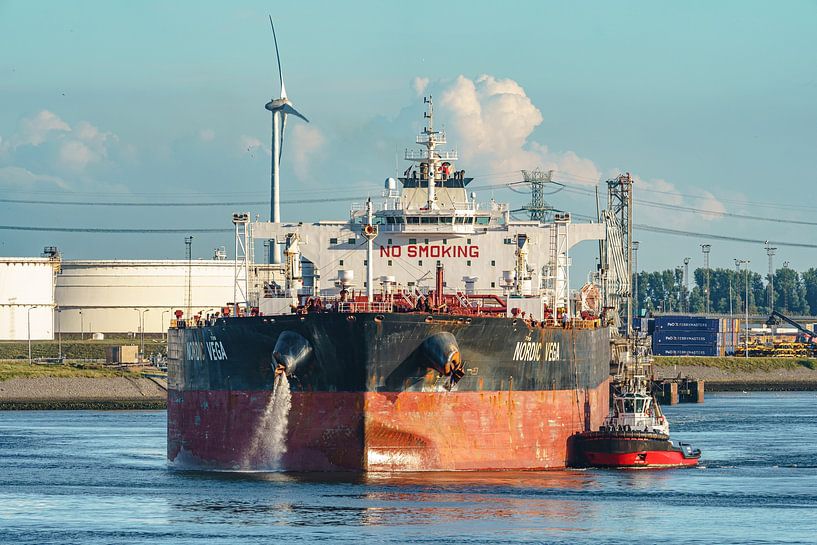 Oil tanker Nordic Vega leaves the port of Rotterdam. by Jaap van den Berg