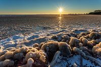 Sunrise over the frozen IJsselmeer