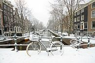Besneeuwd Amsterdam op de grachten in Nederland van Eye on You thumbnail