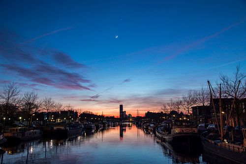 Zonsondergang met de Maan en Venus