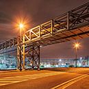 Pipeline bridge crossing a road in industrial area at night, Antwerp by Tony Vingerhoets thumbnail