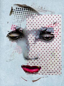 The face with the pink dots