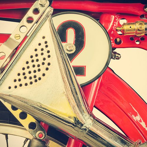 Detail of a classic Ducati Cucciolo motorcycle