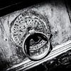 Old door with door handle in Crete, Greece | Black and white detail photo I Street photography by Diana van Neck Photography
