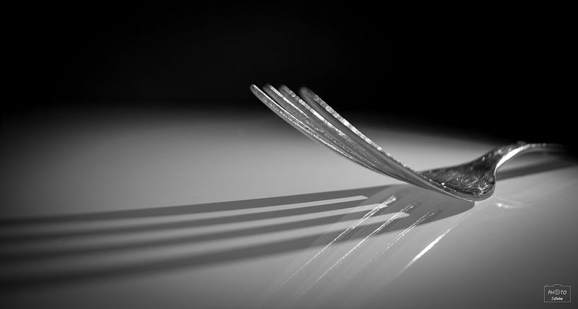Reflectie en schaduwspel vork van Photo Julleke