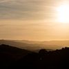 Toscaanse Zonsondergang van Guido Akster