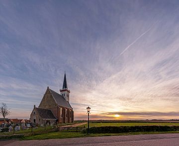 Kerk Den Hoorn met zonsondergang
