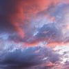 Lucht met wolken bij zonsopgang van Rico Ködder