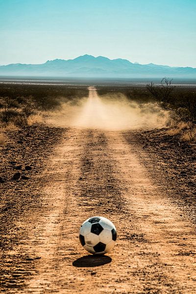 Lonely dirt track with football by Art & Soul Creations