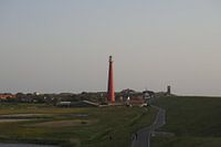 Vuurtoren de Lange Jaap in Den Helder bij zonsondergang