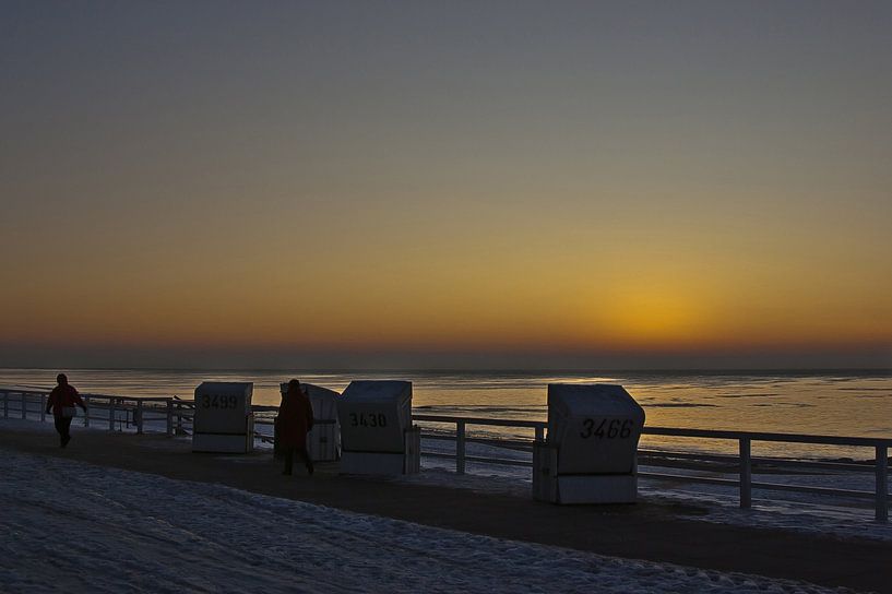 Beach chairs at sunset by Norbert Sülzner
