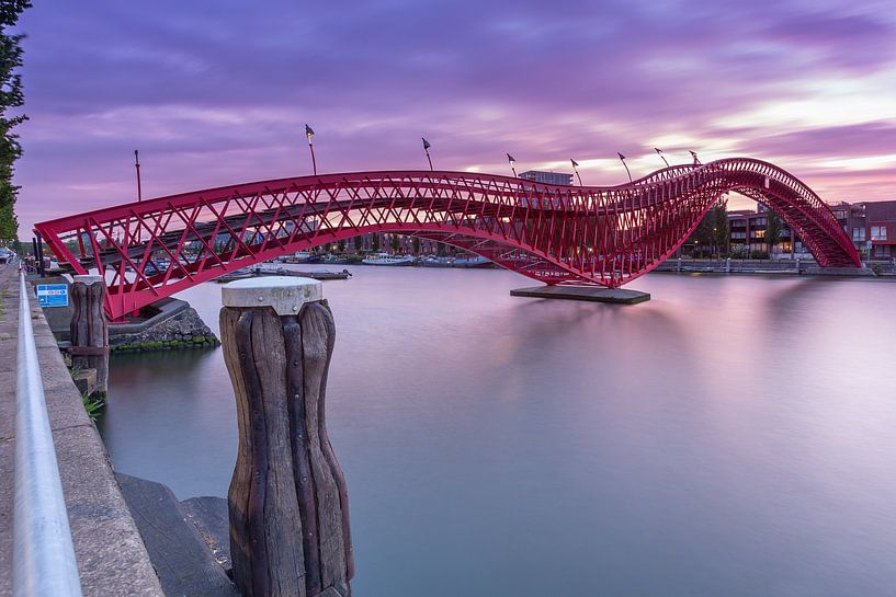 Python bridge, an evening at the water in Amsterdam by Marcel van den Bos