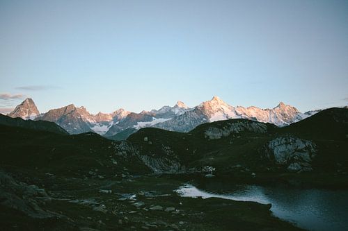 Sunrise illuminates the mountain peaks