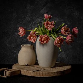 old tulips in a vase